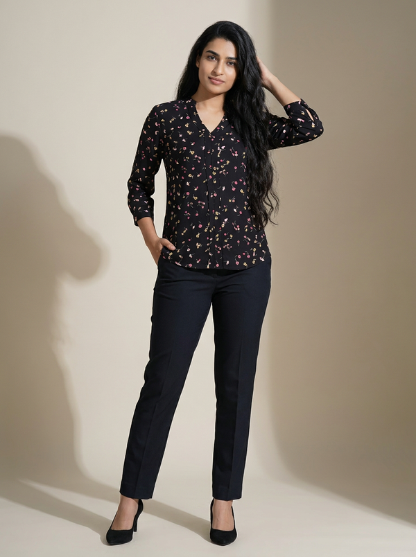 Womens Black Floral Blouse — Editorial catalog photo aligned to brand reference styling; primary product image for search and accessibility.