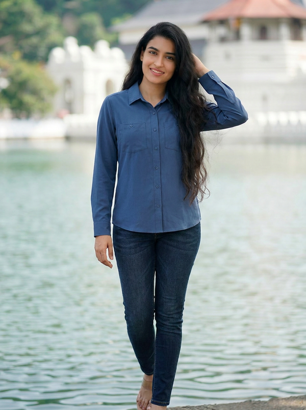 Eddie Bauer Women's Departure Long-Sleeve Travel Shirt in Navy — Editorial catalog photo aligned to brand reference styling; primary product image for search and accessibility.