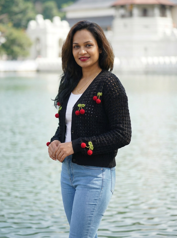 Black Cardigans Cropped Open-Knit V-Neck with Cherry — Editorial catalog photo aligned to brand reference styling; primary product image for search and accessibility.