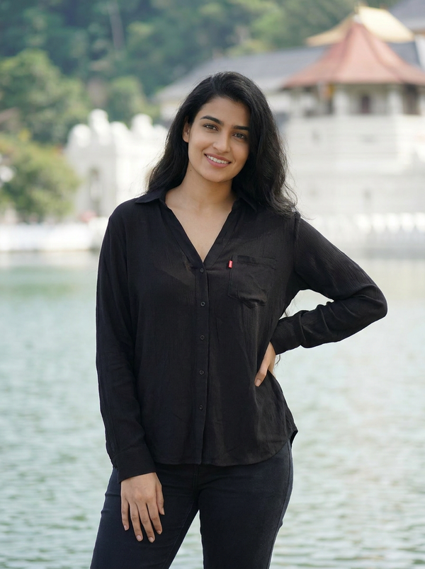 Levis Women's Black V-Neck Long Sleeve Blouse | Relaxed Fit Tunic Top — Editorial catalog photo aligned to brand reference styling; primary product image for search and accessibility.